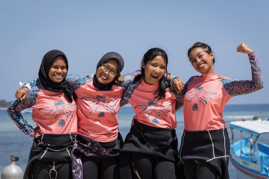 Women collaborating on conservation efforts.