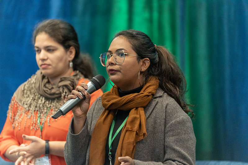 Yashy Raghoo, PhD candidate at the University of Mauritius addresses attendees during the Global Sustainable Island Summit 2024
