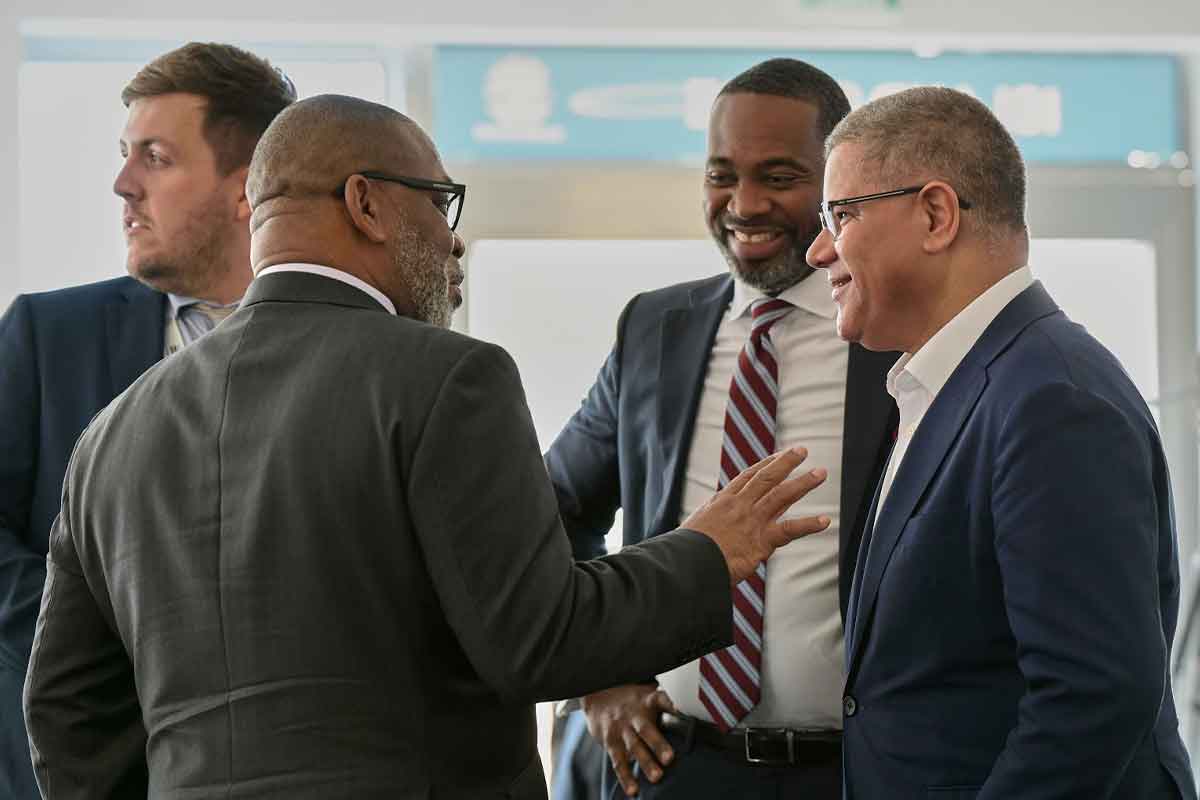 The Honorable Edward David Burt, Premier of Bermuda, and the Honorable Walter Roban, Minister of Home Affairs and Deputy-Premier of Bermuda, engage with the Right Honorable Sir Alok Sharma, COP26 UK President; Credit: Climate Action